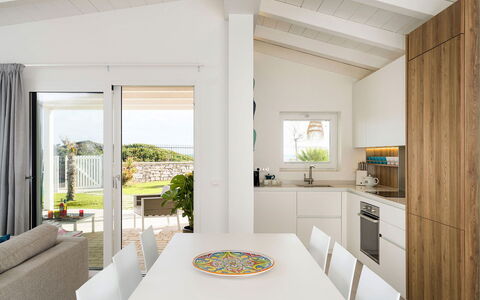Villa Doddi: Furniture, Interior Design, Flooring, Floor, Wood, Ceiling, Kitchen, Home, Countertop, Kitchen & Dining Room Table