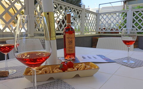 Luisa: Tableware, Bottle, Drinkware, Furniture, Table, Stemware, Food, Barware