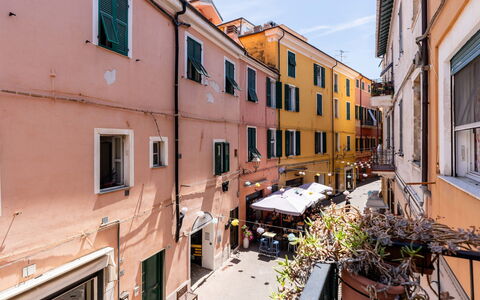 Milena: Town, Neighbourhood, Apartment, Urban Design, Street, Flowerpot, Balcony, Houseplant, Alley
