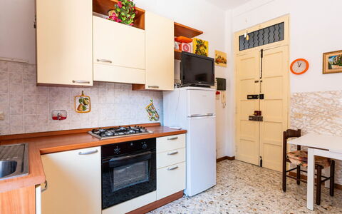 Milena: Major Appliance, Kitchen Appliance, Kitchen, Wood, Flooring, Interior Design, Floor, Countertop, Cabinetry, Home Appliance