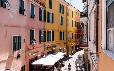 Milena: Town, Neighbourhood, Street, Apartment, Mixed-Use, Alley, Balcony, Flowerpot, Houseplant, Umbrella