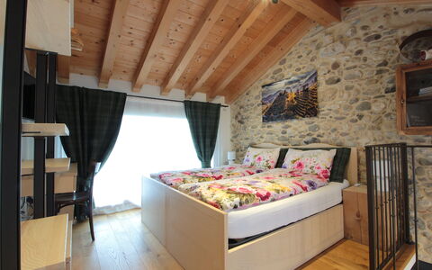 La Casetta dei Palù, Valdobbiadene: Furniture, Interior Design, Ceiling, Chair, Wood Stain, Pillow, Hardwood, Linens, Throw Pillow, Living Room
