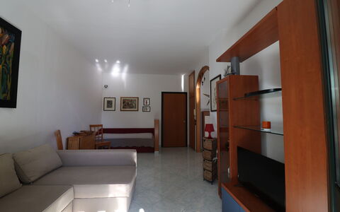 Noemi'S House in Otranto: Flooring, Furniture, Floor, Interior Design, Wood, Couch, Living Room, Room, Ceiling, Lighting