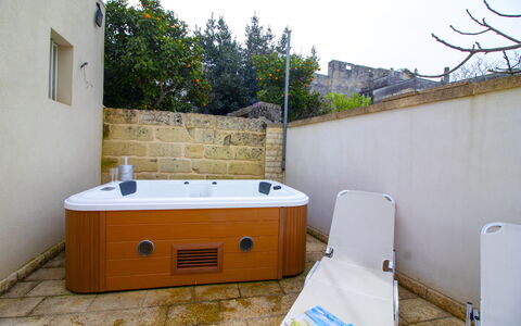 Coclea Heritage Suites: Plumbing Fixture, Bathtub, Swimming Pool, Jacuzzi, Wood Stain, Hotel, Houseplant, Plumbing, Resort