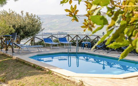 Casale Dolcemare: Blue, Swimming Pool, Outdoor Furniture, Resort, Chair, Shade, Eco Hotel, Landscaping, Sunlounger, Outdoor Structure