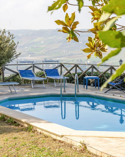 Casale Dolcemare: Blue, Swimming Pool, Outdoor Furniture, Resort, Chair, Shade, Eco Hotel, Landscaping, Sunlounger, Outdoor Structure