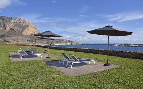 Villa Stornella: Furniture, Outdoor Furniture, Sea, Coastal And Oceanic Landforms, Coast, Ocean, Chair, Shade, Outdoor Table, Shore