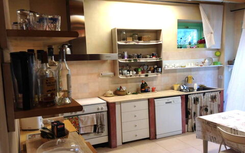 Villa Checco: Kitchen Appliance, Kitchen, Furniture, Major Appliance, Countertop, Interior Design, Cabinetry, Flooring, Shelving, Shelf