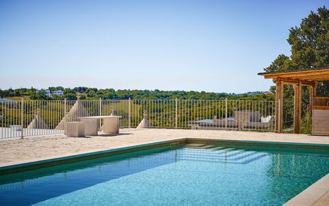 Trullo Emmebi Vista Valle D'Itria: Blue, Swimming Pool, Outdoor Furniture, Composite Material, Resort, Shade, Eco Hotel, Deck, Sunlounger, Chair