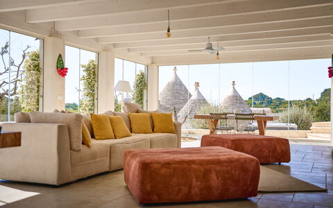 Trullo Emmebi Vista Valle D'Itria: Furniture, Couch, Wood, Interior Design, Floor, Flooring, Living Room, Home, Chair