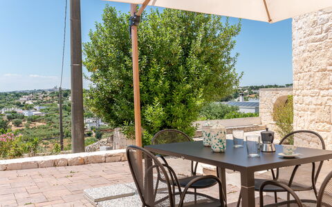 Trullo Miravista Valle D'Itria: Furniture, Outdoor Furniture, Chair, Table, Outdoor Table, Kitchen & Dining Room Table, Flowerpot, Patio, Coffee Table, Garden