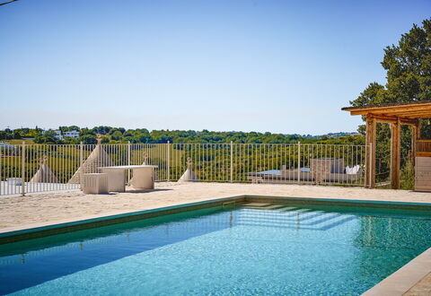 Trullo Emmebi Vista Valle D'Itria: Blue, Swimming Pool, Outdoor Furniture, Composite Material, Resort, Shade, Eco Hotel, Deck, Sunlounger, Chair