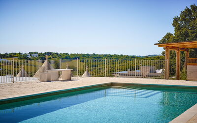 Trullo Emmebi Vista Valle D'Itria: Blue, Swimming Pool, Outdoor Furniture, Composite Material, Resort, Shade, Eco Hotel, Deck, Sunlounger, Chair