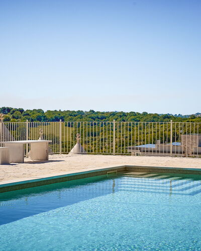 Trullo Emmebi Vista Valle D'Itria: Blue, Swimming Pool, Outdoor Furniture, Composite Material, Resort, Shade, Eco Hotel, Deck, Sunlounger, Chair