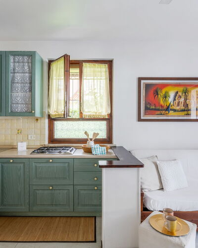 Veranda sul Conero: Furniture, Interior Design, Cabinetry, Flooring, Wood, Kitchen, Countertop, Floor, Kitchen Appliance, Room
