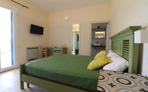 Elegante Villa Casale 50: Furniture, Bed, Interior Design, Bedroom, Floor, Flooring, Wood, Bed Sheet, Ceiling, Bedding