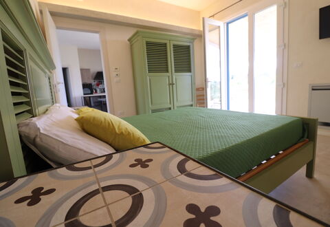 Elegante Villa Casale 50: Furniture, Bed, Bedroom, Interior Design, Floor, Flooring, Wood, Bed Sheet, Bedding, Room