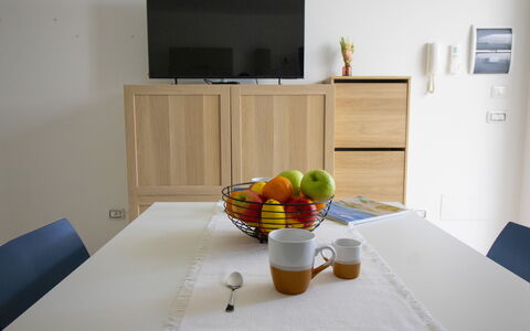 Villa i Gabbiani Otranto: Furniture, Wood, Interior Design, Room, Wood Stain, Chair, Hardwood, Houseplant, Cabinetry, Cupboard