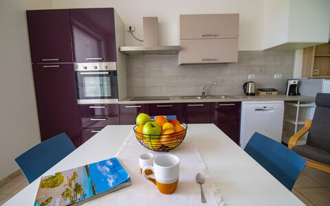 Villa i Gabbiani Otranto: Furniture, Flooring, Interior Design, Wood, Major Appliance, Kitchen Appliance, Kitchen, Floor, Countertop, Room