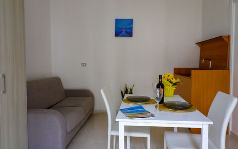 Elaia'S House Cannole: Wood, Flooring, Interior Design, Floor, Apartment, Wood Stain, Hardwood, Chair, Living Room