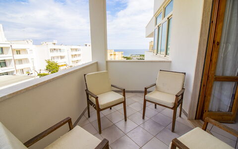 Anisia'S Home Otranto: Apartment, Floor, Condominium, Balcony, Ceiling, Wood Stain, Hardwood, Wood Flooring, Hotel, Chair