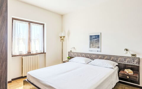 Lidia: Bed, Interior Design, Furniture, Bedroom, Flooring, Wall, Floor, Bed Sheet, Bedding, Room
