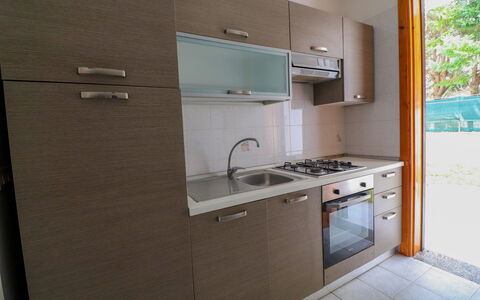 Amanda: Kitchen Appliance, Kitchen, Countertop, Kitchen Sink, Major Appliance, Cabinetry, Wood, Flooring, Stove, Kitchen Stove