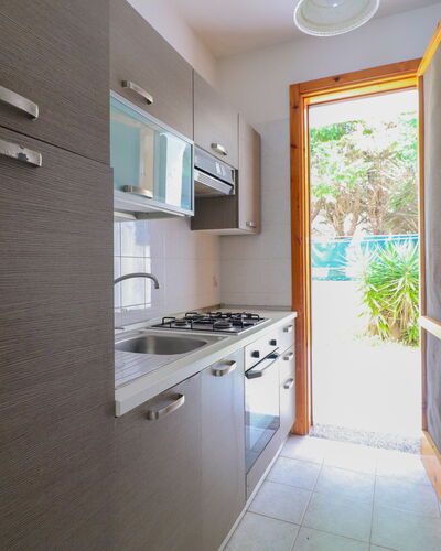 Amanda: Kitchen, Kitchen Sink, Wood, Countertop, Kitchen Appliance, Major Appliance, Flooring, Home, Floor, Interior Design