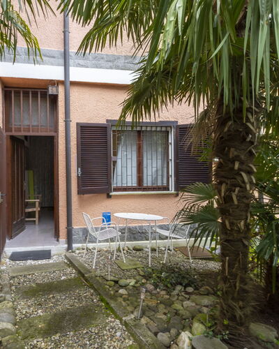 A Moment of Peace: Shrub, Home, Door, Hacienda, Shade, Yard, Driveway, Garden