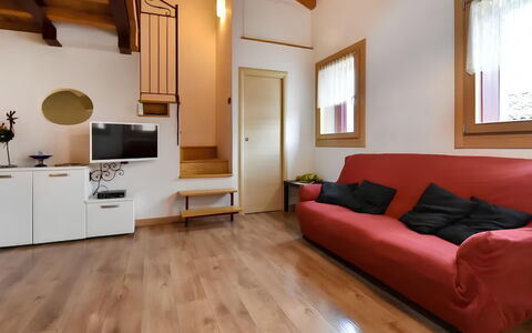 La Corte di Marga - Casa Gustet: Flooring, Interior Design, Wood, Floor, Furniture, Wood Flooring, Room, Ceiling, Home, Living Room