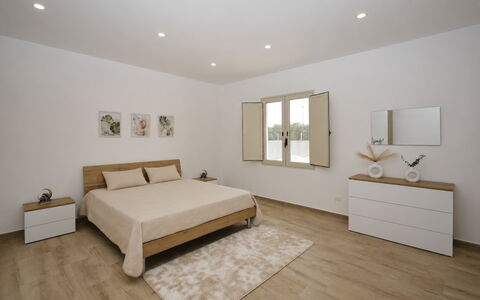 Villa Cosentini: Furniture, Bed, Interior Design, Flooring, Bedroom, Floor, Wall, Wood, Ceiling, Room
