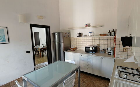 Villa del Monte: Furniture, Flooring, Interior Design, Floor, Kitchen, Lighting, Room, Ceiling, Countertop, Kitchen Appliance