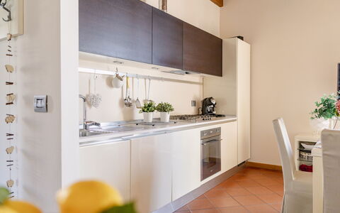 Serafini Holiday Home: Kitchen, Kitchen Appliance, Countertop, Major Appliance, Interior Design, Flooring, Furniture, Cabinetry, Home, Apartment