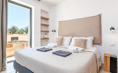 Le Camere di Corte Kalia by Raro Rooms: Bedroom, Apartment, Bedding, Bed, Bed Sheet, Pillow, Bed Frame, Throw Pillow, Design, Hotel