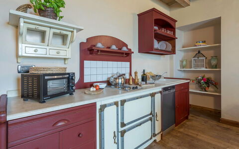 Preseglie Lake Garda: Kitchen, Furniture, Cabinetry, Interior Design, Wood, Kitchen Appliance, Flooring, Countertop, Drawer, Cupboard