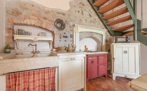 Preseglie Lake Garda: Kitchen, Wall, Furniture, Interior Design, Wood, Countertop, Flooring, Kitchen Appliance, Cabinetry, Major Appliance