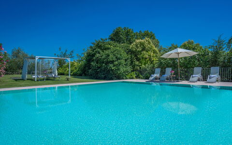 Preseglie Lake Garda: Blue, Swimming Pool, Resort, Leisure, Outdoor Furniture, Shade, Eco Hotel, Thermae, Landscaping, Sunlounger