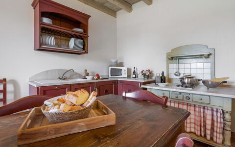 Preseglie Lake Garda: Furniture, Kitchen, Wood, Kitchen Appliance, Interior Design, Cabinetry, Flooring, Countertop, Ceiling, Drawer