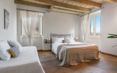 Preseglie Lake Garda: Bed, Furniture, Interior Design, Bedroom, Bedding, Floor, Flooring, Wall, Bed Sheet, Wood