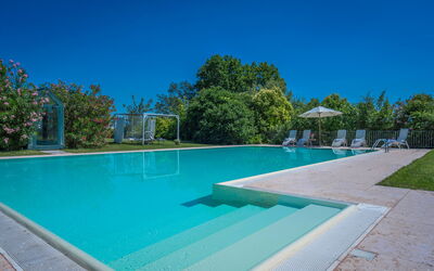 Preseglie Lake Garda: Swimming Pool, Blue, Resort, Composite Material, Leisure, Shade, Eco Hotel, Thermae, Water Feature, Leisure Centre