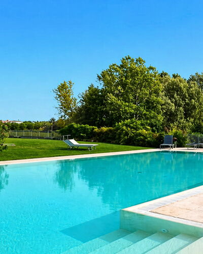 Preseglie Lake Garda: Swimming Pool, Blue, Water, Resort, Composite Material, Water Feature, Shade, Leisure, Eco Hotel, Garden