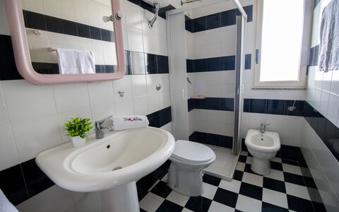 Celeste'S House in Torre Dell'Orso: Flooring, Plumbing Fixture, Floor, Interior Design, Toilet Seat, Toilet, Bathroom, Plumbing, Tile, Sink