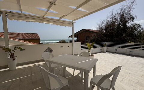 Casa Amare: Furniture, Floor, Chair, Outdoor Furniture, Shade, Outdoor Table, Balcony, Outdoor Structure, Kitchen & Dining Room Table, Coffee Table