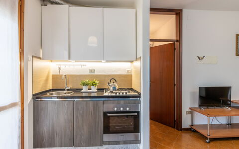 Casa di Lilia: Interior Design, Wood, Flooring, Furniture, Kitchen Appliance, Room, Kitchen, Major Appliance, Ceiling, Floor