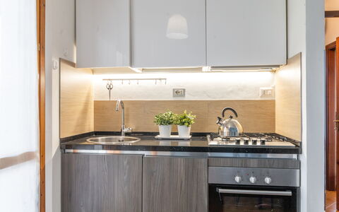 Casa di Lilia: Kitchen Appliance, Kitchen, Major Appliance, Countertop, Interior Design, Cabinetry, Wood, Kitchen Stove, Home Appliance, Stove