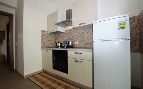 Villa Marzia: Interior Design, Flooring, Wood, Floor, Major Appliance, Furniture, Room, Cabinetry, Plumbing Fixture, Sink