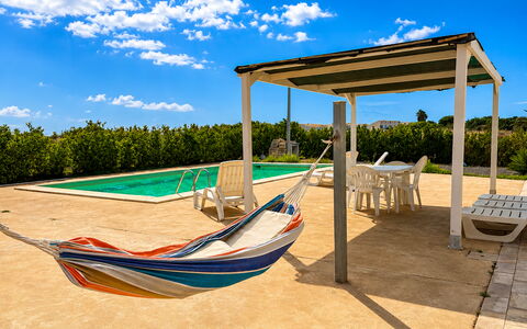 Villa Marzia: Outdoor Furniture, Furniture, Shade, Leisure, Resort, Chair, Eco Hotel, Outdoor Structure, Swimming Pool, Pergola