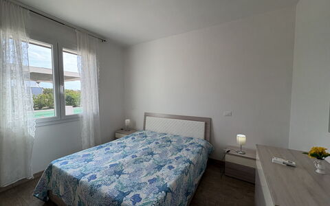 Villa Marzia: Bedroom, Furniture, Bed, Bed Sheet, Interior Design, Floor, Bedding, Flooring, Bed Frame, Linens