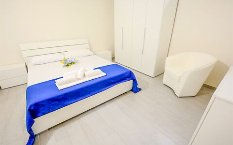 Villa Margherita: Flooring, Floor, Interior Design, Furniture, Bedroom, Bed, Apartment, Room, Ceiling, Bed Sheet