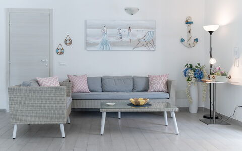 Villa Margherita: Furniture, Interior Design, Couch, Flooring, Floor, Table, Living Room, Room, Chair, Lighting